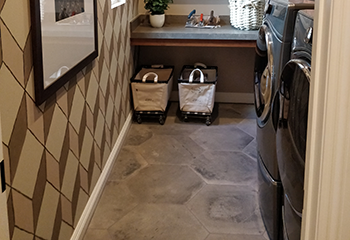 A photo that shows a narrow space with a washer and dryer crammed together